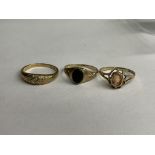 9CT GOLD SMALL CAMEO RING, 9CT GOLD ONYX SIGNET RING AND A 9CT GOLD DIAMOND CHIP RING 5.