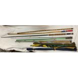 TWO VINTAGE ROD HOLDALL BAGS CONTAINING GLASS AND FIBRE GLASS RODS, BANK STICKS, POLES,