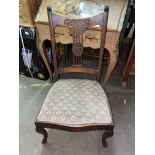 EDWARDIAN WALNUT UPHOLSTERED LOW CHAIR