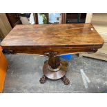 WILLIAM IV ROSEWOOD FOLDOVER CARD TABLE ON AN OCTAGONAL BULBOUS PEDESTAL WITH HAIRY LIONS PAW FEET