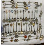 TIN OF NOVELTY AND SOUVENIR PLATED AND ENAMEL TEASPOONS