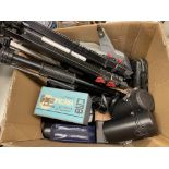 BOX CONTAINING CAMERA TRIPODS, ADJUSTABLE TRIPODS,