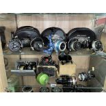 TWO SHELVES OF VINTAGE FIXED SPOOL FISHING REELS INCLUDING THE GARCIA MITCHELL 300 AND 440A,