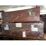 TWO EARLY 20TH CENTURY LEATHER STITCHED SUITCASES
