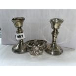 PAIR OF BIRMINGHAM SILVER FILLED DWARF CANDLESTICKS AND A LONDON SILVER WRYTHEN TABLE SALT WITH