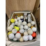 QUANTITY OF GOLF BALLS AND A PAIR OF SPORTS SHOES