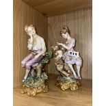 PAIR OF CAPODIMONTE BOY AND GIRL FIGURE GROUPS BY VOLTA