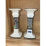 PAIR OF ROYAL DOULTON PELICAN SHAPED CANDLESTICKS DECORATED WITH BUTTERFLIES AMONGST FLOWERS