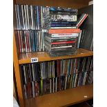 TWO SHELVES OF VARIOUS CDS FROM VOCALISTS TO PINK FLOYD,