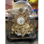 19TH CENTURY GILDED SPELTER FRENCH MANTLE CLOCK UNDER GLASS DOME WITH KEY