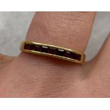 9CT YELLOW GOLD CHANNEL SET RUBY RING 1.7G APPROX.
