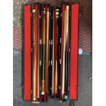 FOUR CASED SNOOKER CUES AND OTHERS