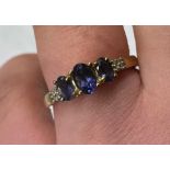 9CT SAPPHIRE AND DIAMOND CHIP RING 2.