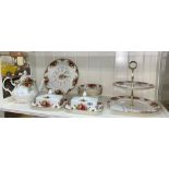 SHELF OF ROYAL ALBERT OLD COUNTRY ROSES TEAPOT, WALL CLOCK, CAKE STAND, BUTTER DISHES, BOWLS,