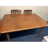 TEAK EXTENDING TABLE AND FOUR CHAIRS