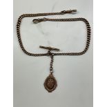 9CT ROSE GOLD ALBERT CHAIN WITH T BAR, MEDALLION FOB AND SNAP SWIVEL 42.