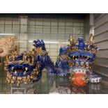 TWO BLUE AND GILDED CHINESE PORCELAIN DOGS OF FO