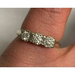 9CT WHITE GOLD AND THREE STONE ROUND BRILLIANT CUT DIAMOND RING (0.