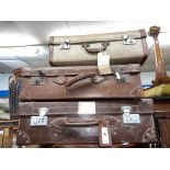 TWO EARLY 20TH CENTURY LEATHER STITCHED SUITCASES