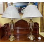 PAIR OF BRASS DECORATIVE ELECTRIC TABLE LAMPS WITH CREAM SHADES