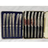 TWO CASES OF SIX SILVER HANDLED BUTTER KNIVES