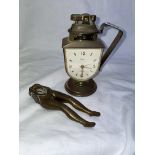 PAIR OF LEGS NUTCRACKERS AND A SWIZ CLOCK TABLE LIGHTER
