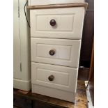 PAIR OF CREAM THREE DRAWER BEDSIDE CHESTS