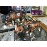 FOUR BESWICK HORSE AND FOAL FIGURES A/F