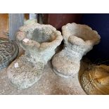 THREE STONEWORK BOOT PLANTERS