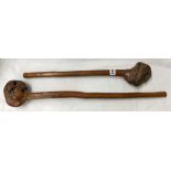 TWO POLYNESIAN ROOT WOOD THROWING CLUBS