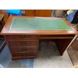 YEW GREEN LEATHER GILT TOOLED SCIVER TOPPED KNEEHOLE DESK WITH PULL OUT SLIDE