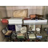 TWO SHELVES OF VINTAGE ADVERTISING BOXES AND TINS, SHOE BOWS, LACE,