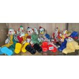 SHELF OF CERAMIC HEADED CLOWN DOLLS