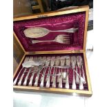 MAHOGANY CASED CANTEEN OF FISH CUTLERY AND A CANDLE SNUFFER