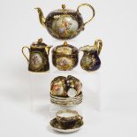 Ambrosius Lamm Dresden-Decorated Blue and Gilt Ground Tea Service, early 20th century, teapot height