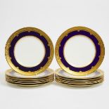 Set of Twelve Royal Doulton Blue and Gilt Bordered Service Plates, 1920s, diameter 10.4 in — 26.5 cm