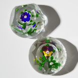 Baccarat Pansy and Blue Primrose Faceted Glass Paperweights, mid-19th century, diameter 2.6 in — 6.7