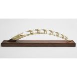 African Carved Ivory Elephant Bridge with Crocodile, late 19th to early 20th century, length 26.5 in