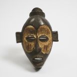 Unidentified Mask, possibly West African, mid 20th century, height 13.75 in — 34.9 cm
