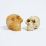 Two Archaic Carved Hardstone Skulls, largest height 1.5 in — 3.8 cm (2 Pieces)
