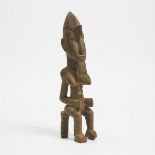 Senufo Seated Female Figure, South Africa, mid 20th century, height 18 in — 45.7 cm