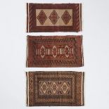 Three Pakistani Bokhara Rugs, c.1970, 3 ft 6 ins x 1 ft 11 ins — 1.1 m x 0.6 m; 3 ft 4 ins x 2 ft 1