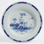 English Delft Blue and White Chinoiserie Charger, mid 18th century, diameter 14.75 in — 37.5 cm