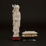 Two Ivory Carvings of Shoulao and a Landscape Within a Clam Shell, Mid 20th Century, 建国初期 牙雕摆件一组两件,