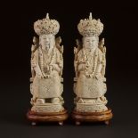 An Ivory Carved Emperor and Empress Pair, Mid 20th Century, 建国初期 牙雕帝后像一对, height 10.5 in — 26.7 cm (