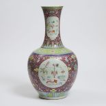 A Large Ruby-Ground Famille Rose Bottle Vase, Qianlong Mark, Republican Period, 民国 胭脂红地粉彩缠枝莲博古图大瓶, h