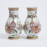 A Pair of Famille Rose 'Hundred Antique' Hu Vases, Qianlong Mark, Republican Period, 民国 乾隆款 粉彩'博古图'瓶