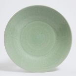 A Chinese Celadon Glazed Charger, 19th/20th Century, 晚清/民国 豆青釉刻花大盘, diameter 13.6 in — 34.5 cm