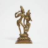 An Indian Bronze Figure of Shiva and Parvati, 20th Century, height 11.3 in — 28.8 cm