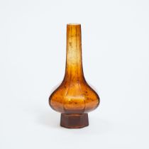 A Gold-Splashed Amber Glass Octagonal Bottle Vase, Qianlong Mark, 乾隆款 琥珀色料洒金八角瓶, height 7.7 in — 19.
